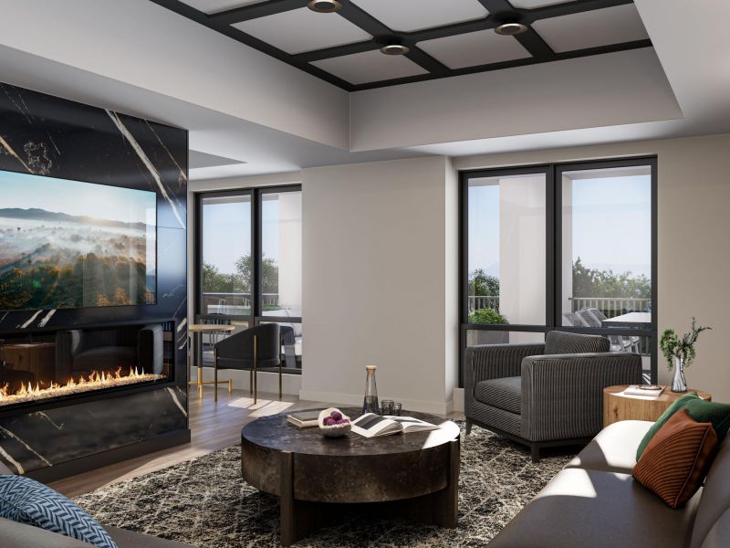 Modern living room with sofas, a round coffee table, fireplace, TV, large windows, and balcony view.